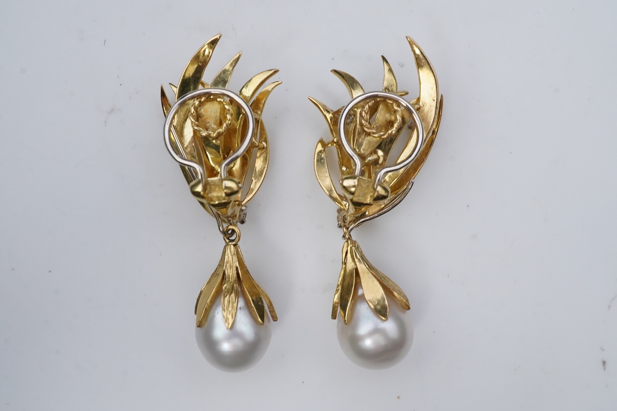 A pair of aquamarine, cultured pearl and diamond ear clips, third quarter 20th century